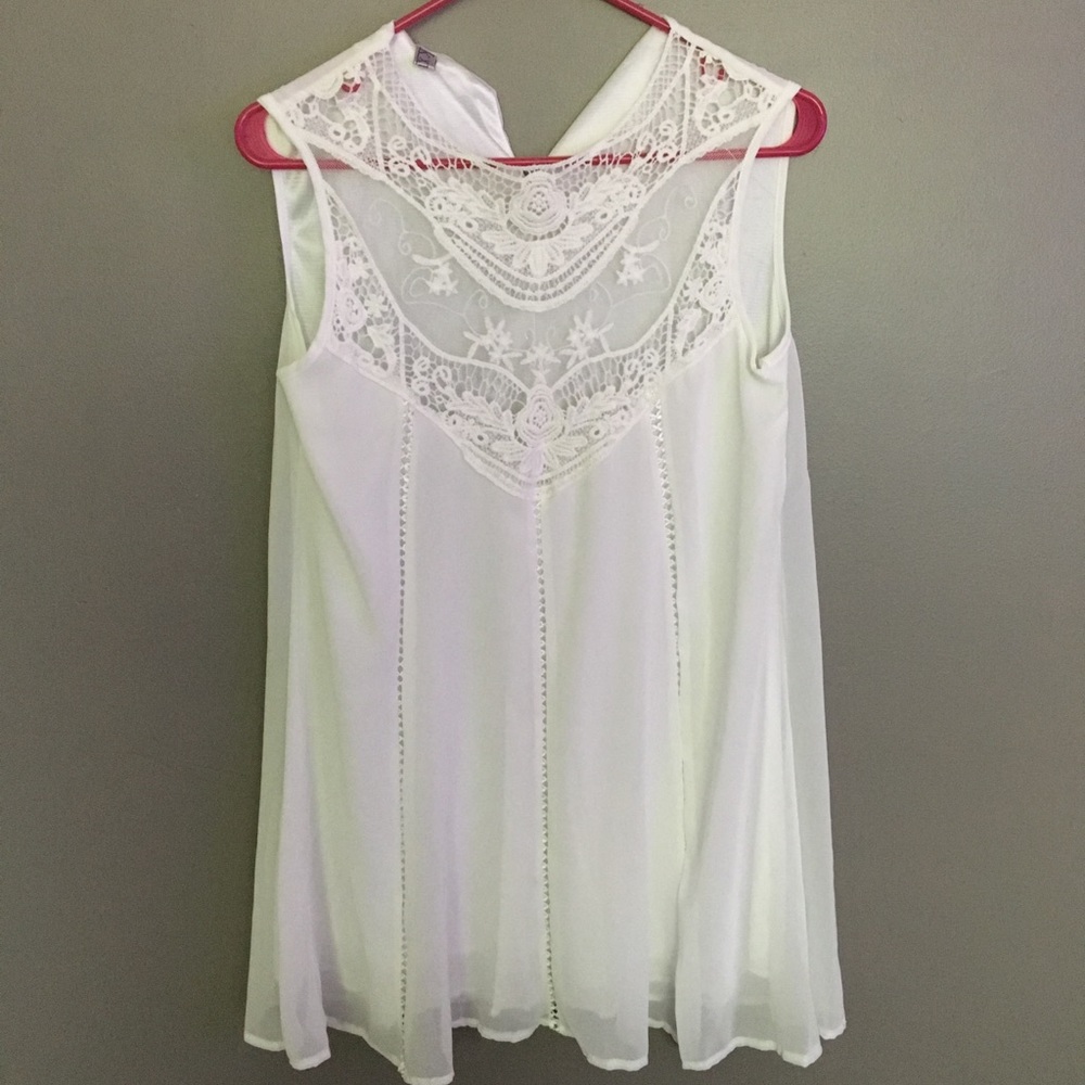 Gorgeous white dress with lace detail!